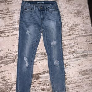 Mid to high rise slightly ripped jeans